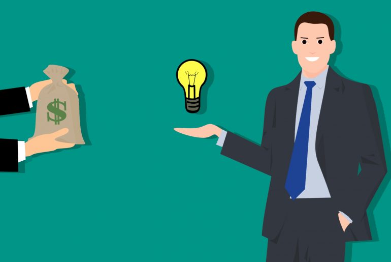 Businessman holding a lightbulb symbolizing idea exchange with money bag from another person on a teal background.