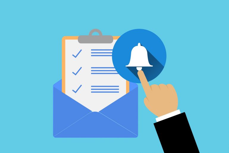 Checklist in envelope with hand tapping notification bell for alerts on blue background.