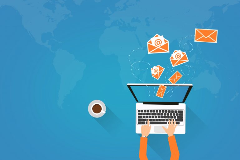 Illustration of a person typing on a laptop with emails flying out above a blue world map background with coffee cup nearby.