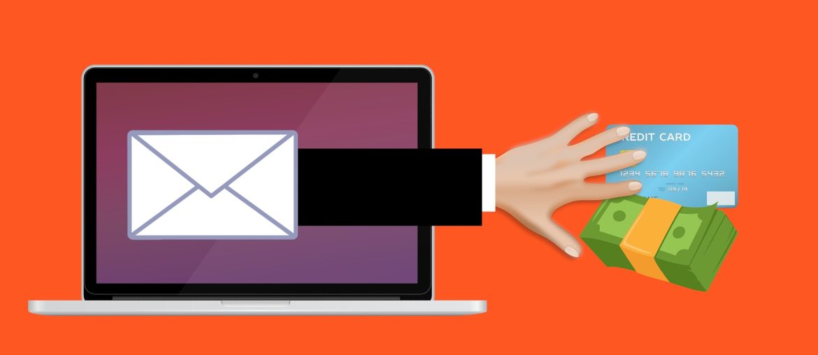 Laptop with email icon, arm extending to grab credit card and cash, symbolizing online financial phishing scam.