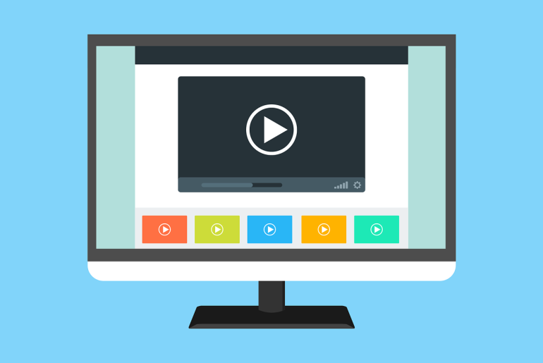 Computer monitor displaying video player interface with colored control buttons on light blue background.