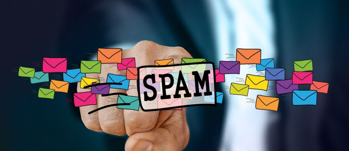 How to Easily Spot Spam Emails and Phishing Scams Finger pointing at a SPAM sign surrounded by colorful email icons, symbolizing unwanted email messages.
