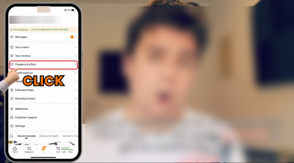 Person pointing at smartphone screen with highlighted Coupons & offers option, urging to click for deals.