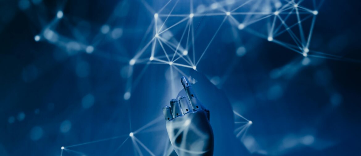 Robot hand pointing at a digital network of interconnected nodes and lines in a blue-toned futuristic setting.